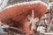 The hull and propeller of a fishing boat during renovation in the port of Wladyslawowo