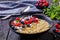 Hulled whole grain oat porridge with berries