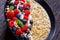 Hulled whole grain oat porridge with berries