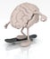 Human brain with arms and legs on skateboard