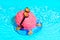 Human Brain Character Floats in the Pool