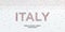 Human country name Italy. large group of people form to create country name Italy.
