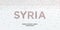 Human country name Syria. large group of people form to create country name Syria.