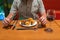 Human eating assortment of delicious food in luxury buffet meal