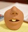 Human face mold beige color in shape of mouth, nose