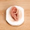 Human Facial Ear Prosthesis on Wooden Table