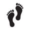 Human feet black silhouette on white background. Footprint with toes symbol icon