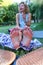 human feet after standing on yoga nail desk sadhu closeup photo on green grass background