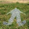 Human figure imprinted on grass