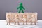 Human Figure Standing On Top Of Wooden Blocks