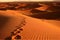 human footprints in the desert. Neural network AI generated