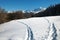 Human footprints in the snow in the mountains