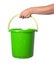 Human hand holding empty plastic pail