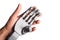 Human hand holding robotic hand