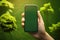 Human hand holding smartphone and green earth ESG icon environmental, social governance in sustainable ethical business