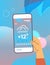 human hand holding smartphone with daily temperature mobile app weather forecasting and meteorology concept