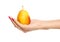 Human hand holding yellow pear