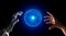 Human hand and robot hand with HUD circle interface and binary number code on black screen background, artificial intelligence, AI