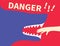 Human Hand in Shark Jaws and Word Danger Banner