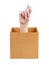 Human hand sticking out of a box