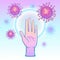 Human hand is surrounded by many viruses. Aura of protection.