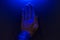 Human Hand Under Blue Light