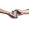 Human hands held metal cans between them. Concept about donation to homeless and sharing, on white background