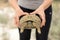 Human hands holding big tortoise. Wildlife reptile outdoors. Horizontal format. Soft focus. Close-up shot