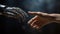 The human hands touch the robot\\\'s metallic hand. Concept of harmonious coexistence of humans and AI technology