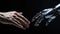 The human hands touch the robot\\\'s metallic hand. Concept of harmonious coexistence of humans and AI technology