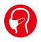 Human head wearing a medical mask on red dot background, seen in profile. Coronavirus.