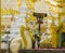 A Human-Lion sculpture and a Buddha statue at Shwedagon Pagoda