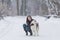 Human and Pet Relationships Concepts. Portrait of Lovely Caucasian Brunette Woman Along With Her Husky Dog