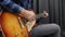 Human playing on guitar. Professional musician guitarist performing lyric solo on electric guitar in modern music studio. Guitar l