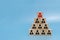 Human resource. boss icon on wooden cube block on top pyramid stack on blue background with copy space