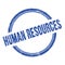 HUMAN RESOURCES text written on blue grungy round stamp