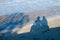 Human shadows on a beach