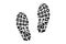 Human shoe footprints. Pair of prints of sneakers or boots. Left and right leg. Shoe sole. Walking foot steps. Black and