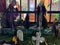 Human skulls bones and crosses at dusk on the ground. Terrible Halloween concept, scary skull mockup at dusk