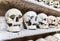 Human skulls inside a catacomb.