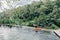 Human swimming in Bali infinity pool