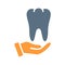 Human tooth on hand colored icon. Care, rescue, treatment, disease prevention symbol