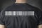 Human trafficking tittle and barcode on black t-shirt. Back