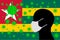 Human using a Mouth Face Masks or  Mouth Cover ro surrounded wiht virus with TOGO flag