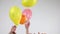 Humand hands and flying balloons wirh cryptocurrency.