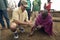 Humane society Chief Executive Officer, Wayne Pacelle, learning to make fire from tribesman near Tsavo National Park in Kenya, Afr