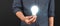 Humans hold light bulbs in hand innovative technology and creativity