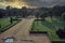 Humayun tomb entrance and a royal garden against dramatic sunset located in New Delhi, India