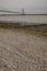 Humber Bridge, England, the UK - pebbles on the beach.