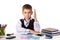 Humble excellent pupil with hand up sitting at the table on the white background